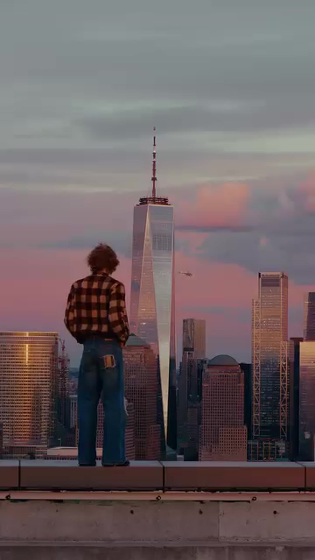 Shane Boyer filming a New York sunset by One World Trade Center